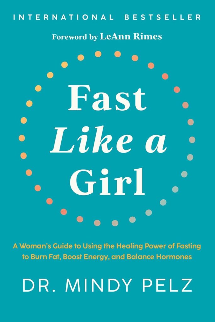 Fast Like a Girl: A Woman’s Guide to Using the Healing Power of Fasting to Burn Fat, Boost Energy, and Balance Hormones     Hardcover – Big Book, 27 December 2022